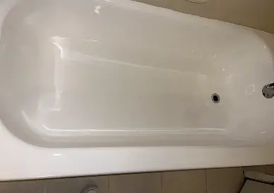 After Professional bathtub refinishing showing bright and like-new appearance