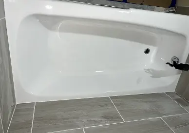 After Bathtub makeover highlighting dramatic transformation and renewed shine