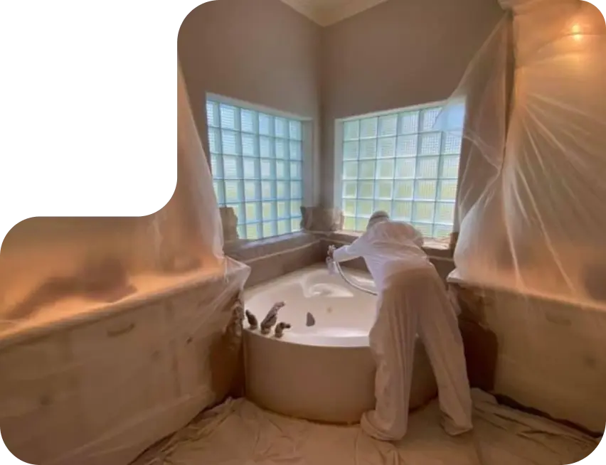 a man refinishing a bathtub