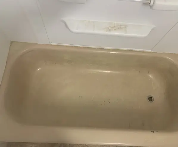 Before bathtub reglazing by JS Bathtub Resurfacing showing worn surface in New Orleans