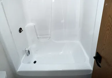 After shower refinishing with shiny and smooth tile surface