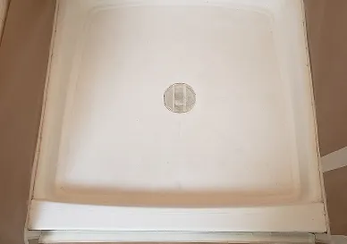 After shower refinishing with smooth glossy tile finish