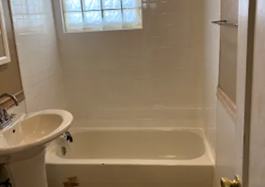 After Old worn tiles restored to a clean and vibrant look