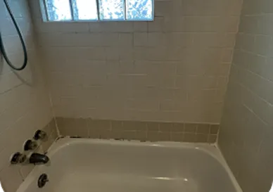 Before Old worn tiles restored to a clean and vibrant look