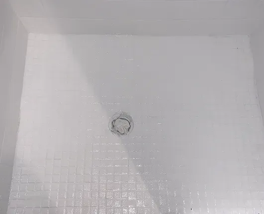 Professional shower tile restoration with polished finish