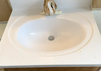 After sink refinishing with glossy clean appearance