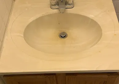 After sink reglazing with smooth reflective surface