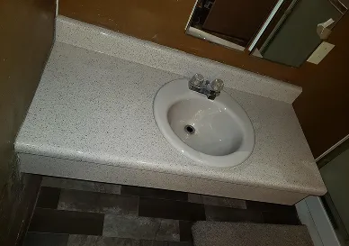 After sink reglazing with smooth glossy finish and renewed shine