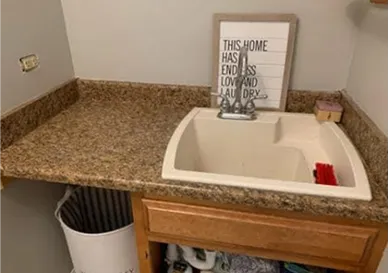 Before sink restoration with scratches and discoloration